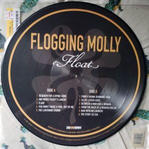 Back side of Flogging Molly album 